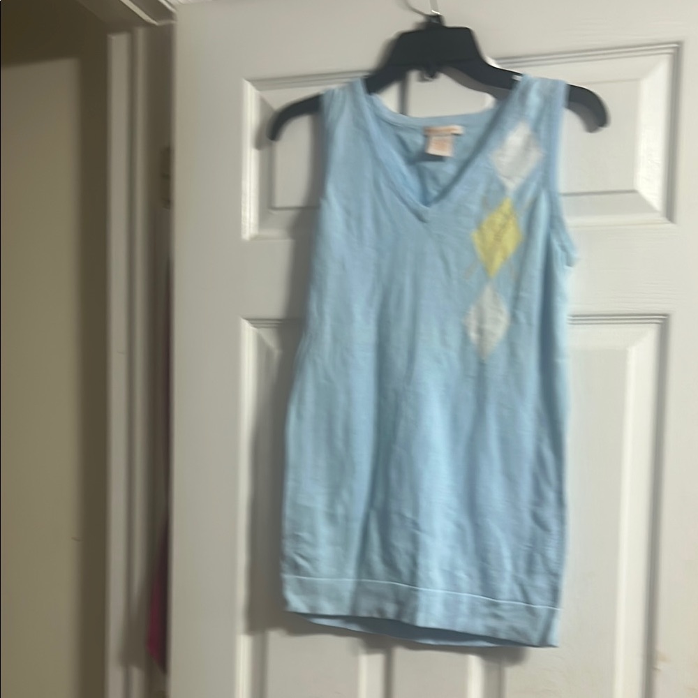 Light Blue Sleeveless Top with Diamond Pattern